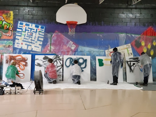 five students painting